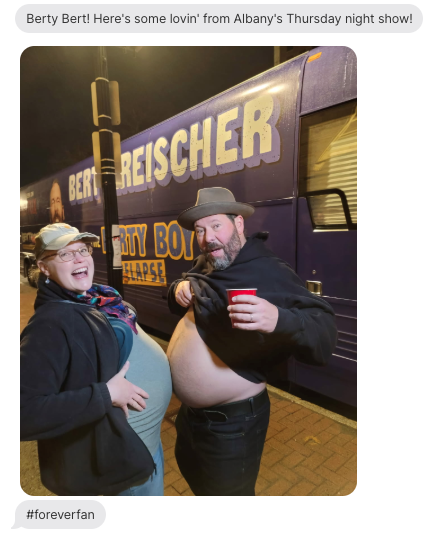 Bert Kreischer with a fan in front of his Berty Boy tour bus